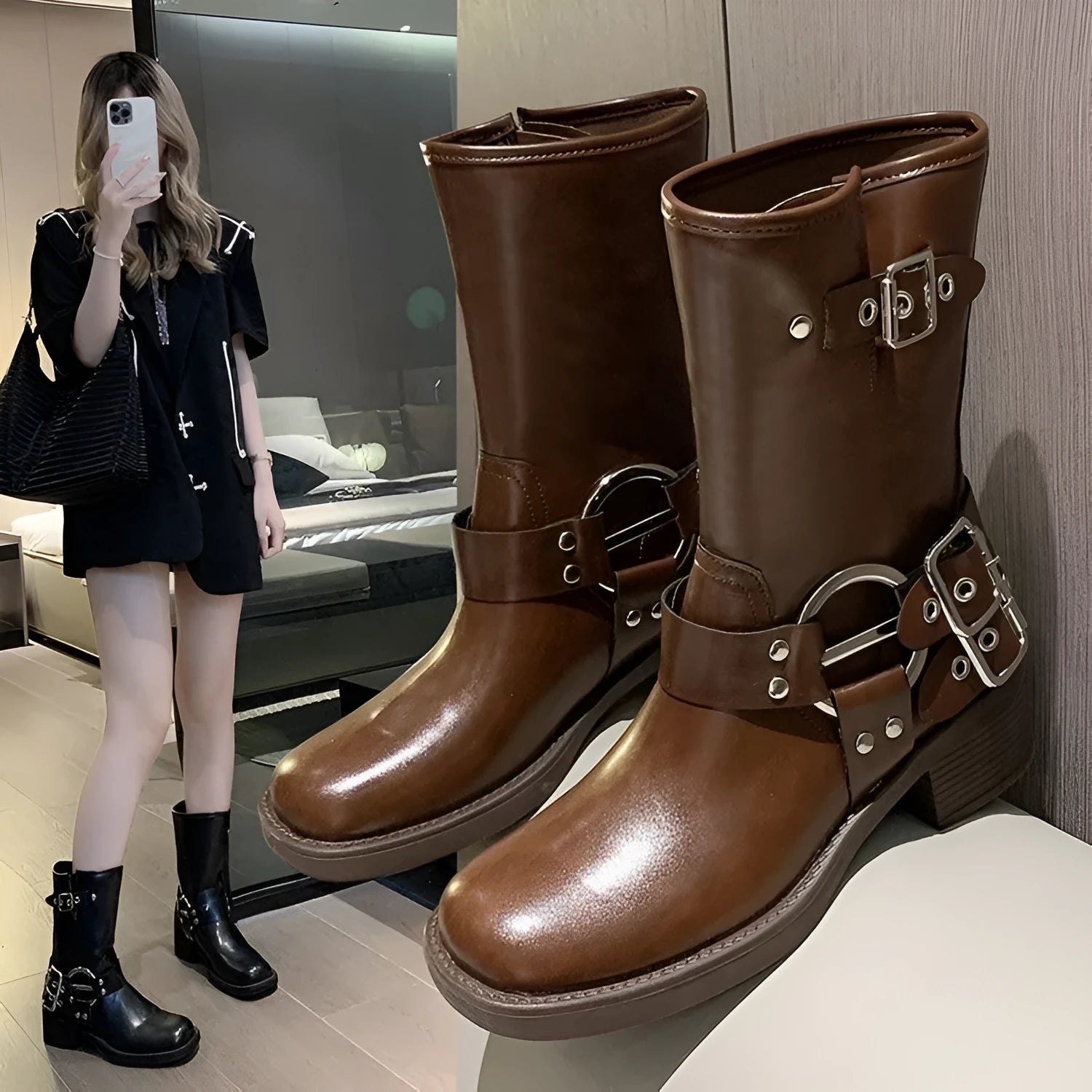Women's platform boots with belt buckle detail at mid-calf length