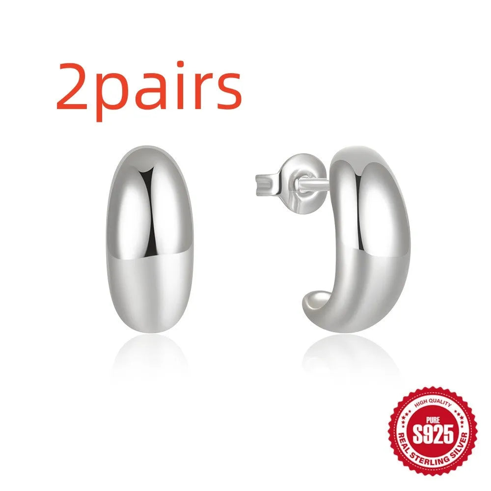 C-shaped 925 sterling silver stud earrings with electroplated gold finish