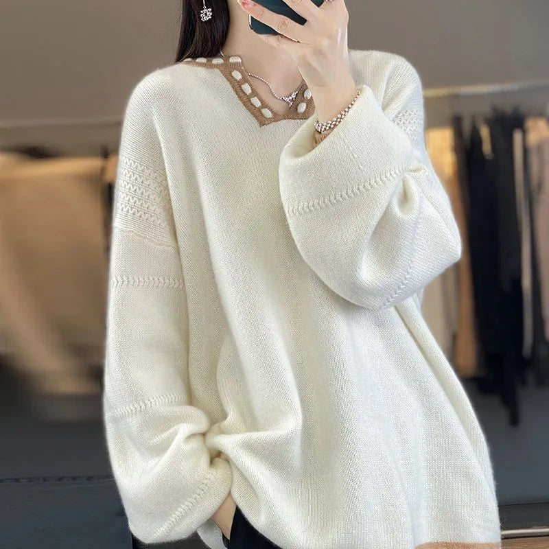 Women's white V-neck viscose sweater with long sleeves on hanger