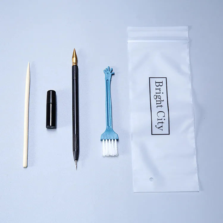 Scraping painting tool set with scratch pens, small scrapers, and white card paper for texture art