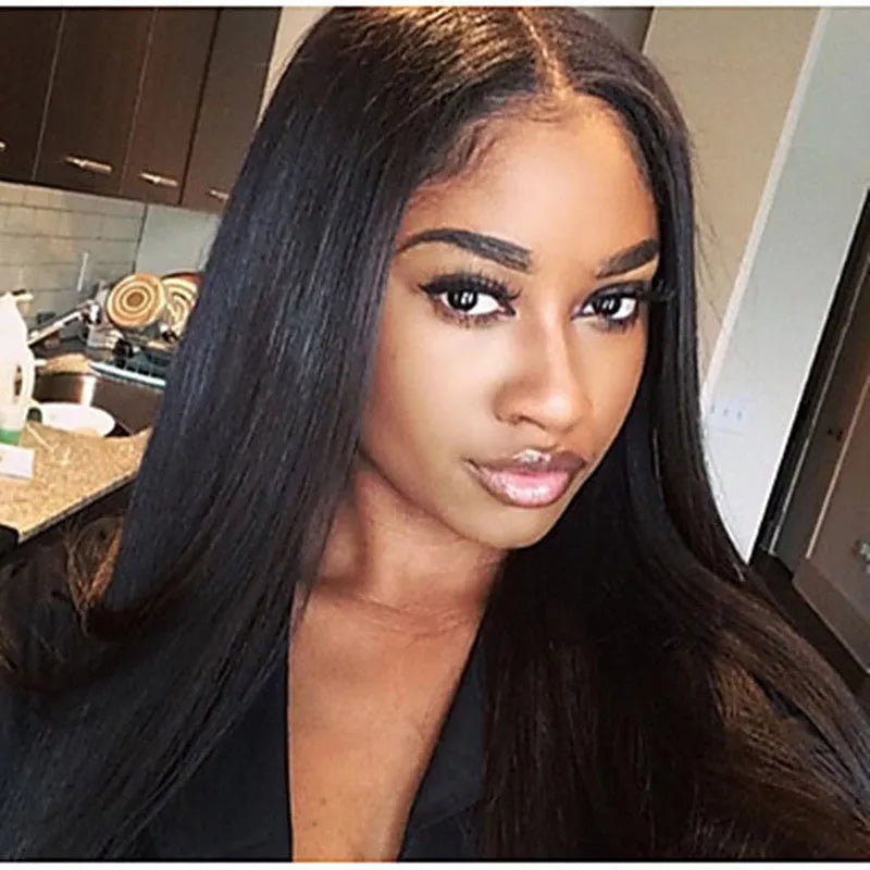 Long straight synthetic wig with centre-parted bangs in black colour on display