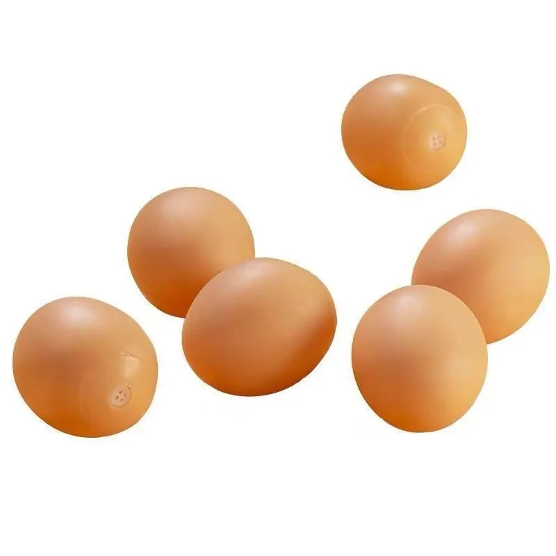 Egg-shaped dog squeaky toy for dental cleaning with sound mechanism