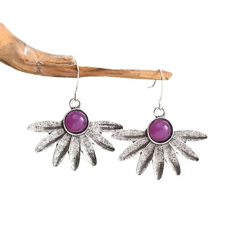 Purple bohemian earrings with animal zodiac modelling and resin gemstone accents