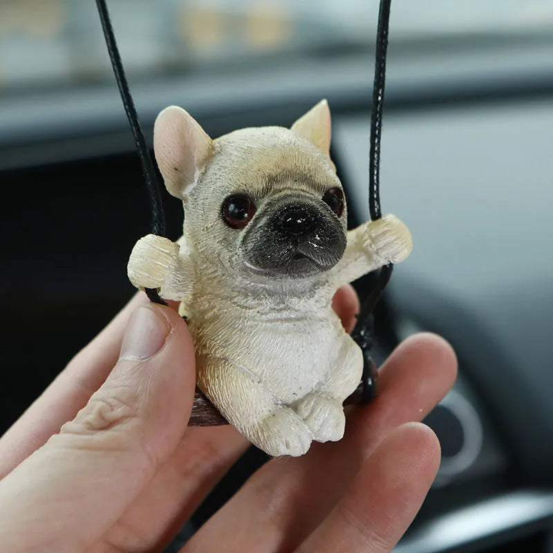 Resin bulldog car pendant hanging ornament in cartoon style for rearview mirror.
