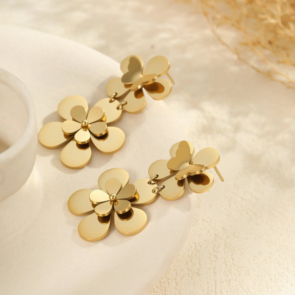 Gold-coloured butterfly earrings with flower and geometric designs for women