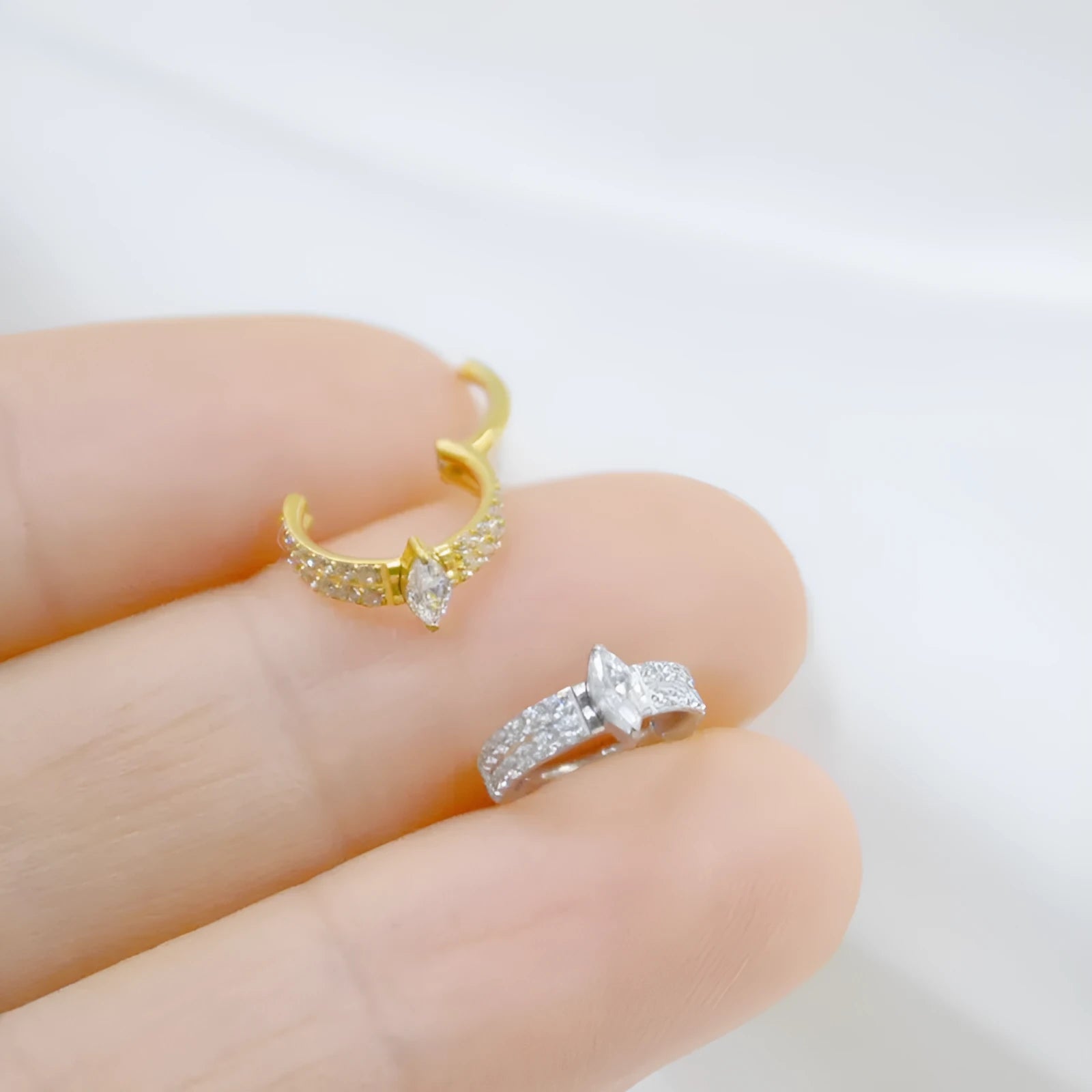 Heart-shaped titanium steel earrings with zircon stones in silver or gold colour