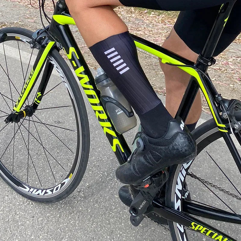 Athletic sports socks in orange, black, purple, white, grey or dark blue colours