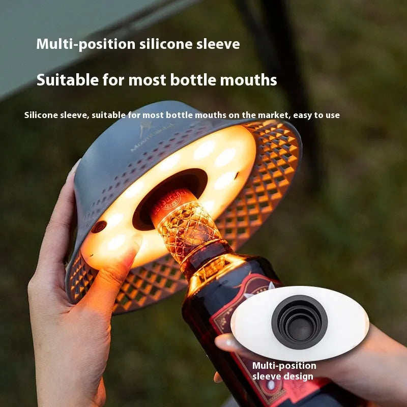 Camping lantern with wine bottle shade design in beige colour showing USB-C charging port