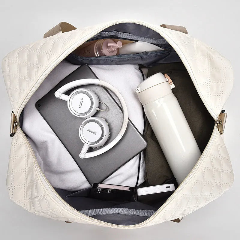 Large Oxford cloth leisure travel bag in a solid colour with sewing thread detail, shown in a 36-55L capacity size.