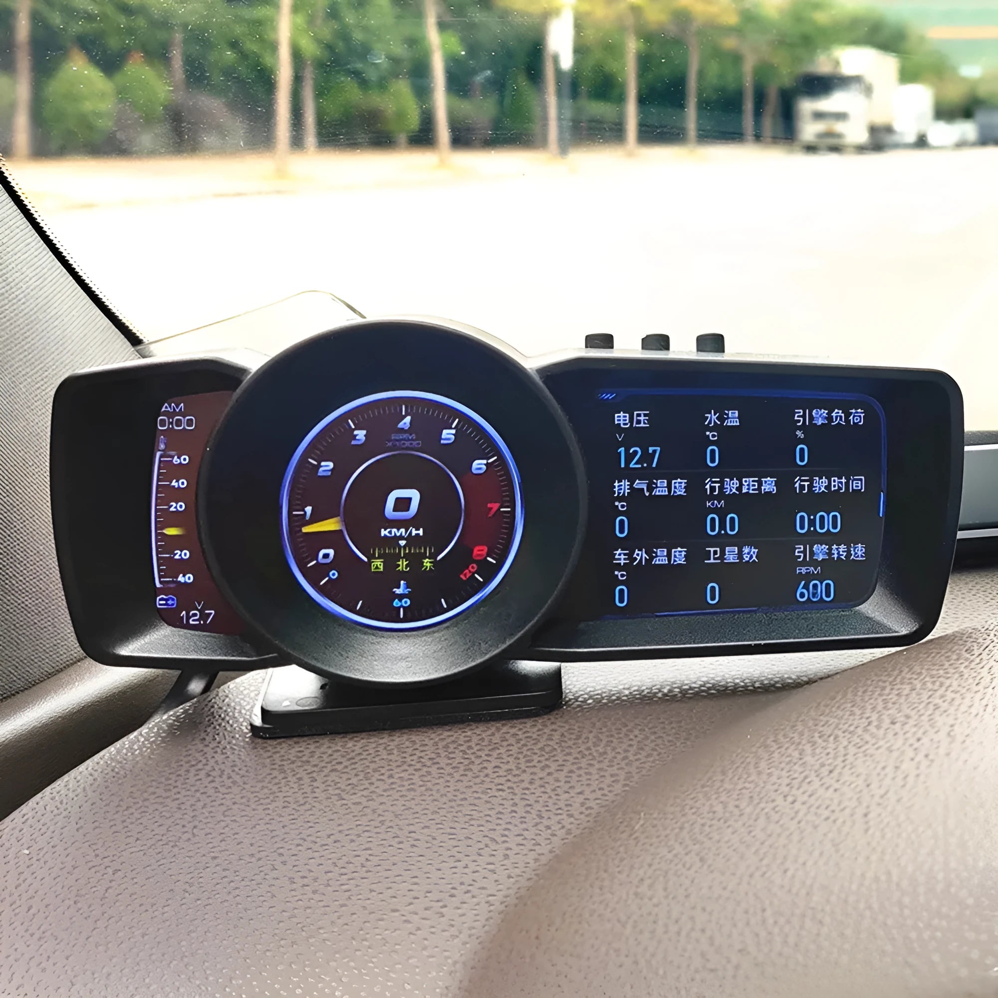 OBDII A600 vehicle driving monitor computer with HD screen on a car dashboard