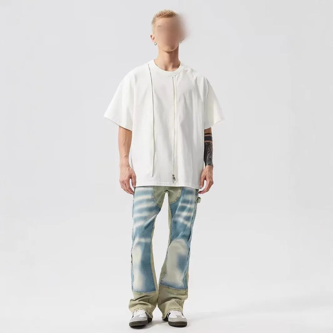 Retro yellow and blue patchwork jeans with splash-ink damaged design on polyester denim fabric