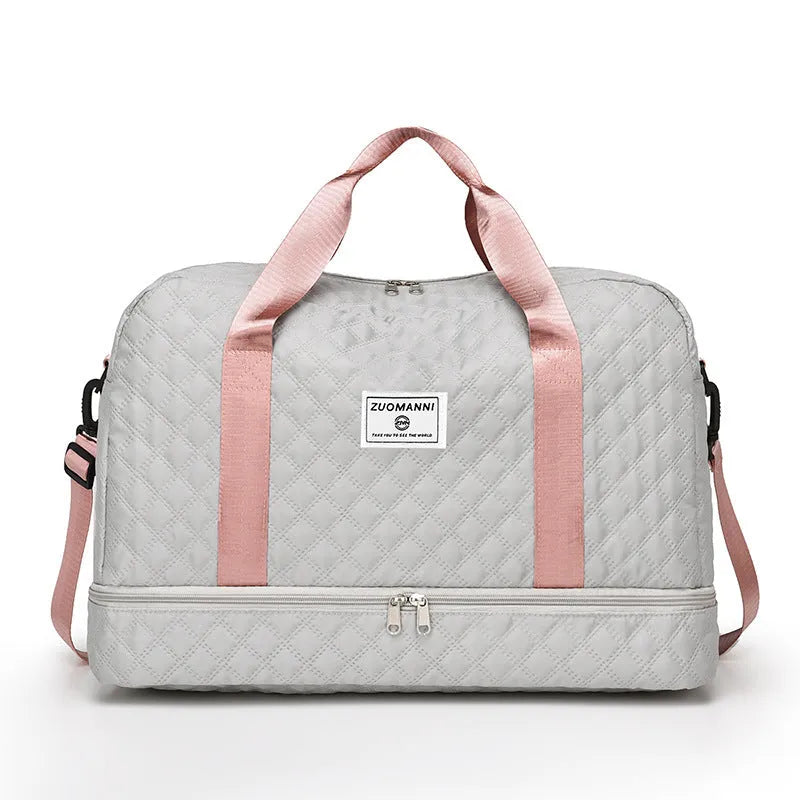 Large Oxford cloth leisure travel bag in a solid colour with sewing thread detail, shown in a 36-55L capacity size.