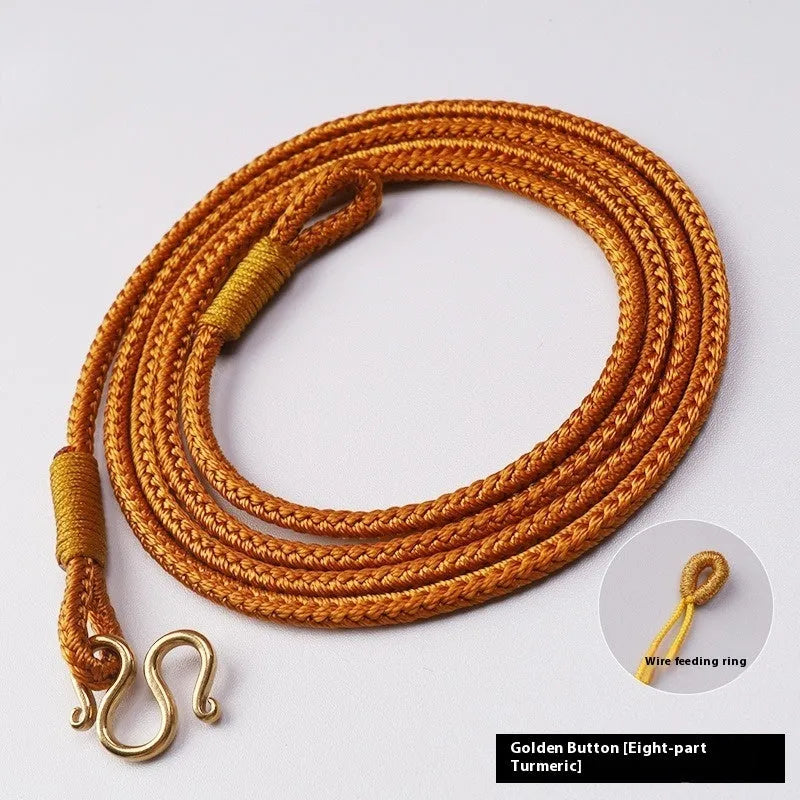 Gold peace buckle choker necklace with intricate mixed gemstone inlaid pendant on a model.