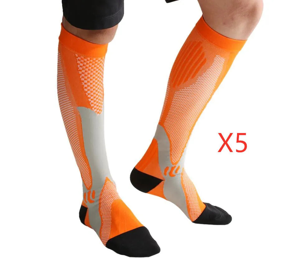 Black graduated compression socks with athletic fit for men and women, shown laid flat.