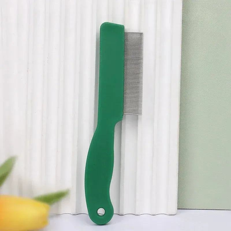 Green plastic handle stainless steel pet flea comb for dogs and cats on a white background.