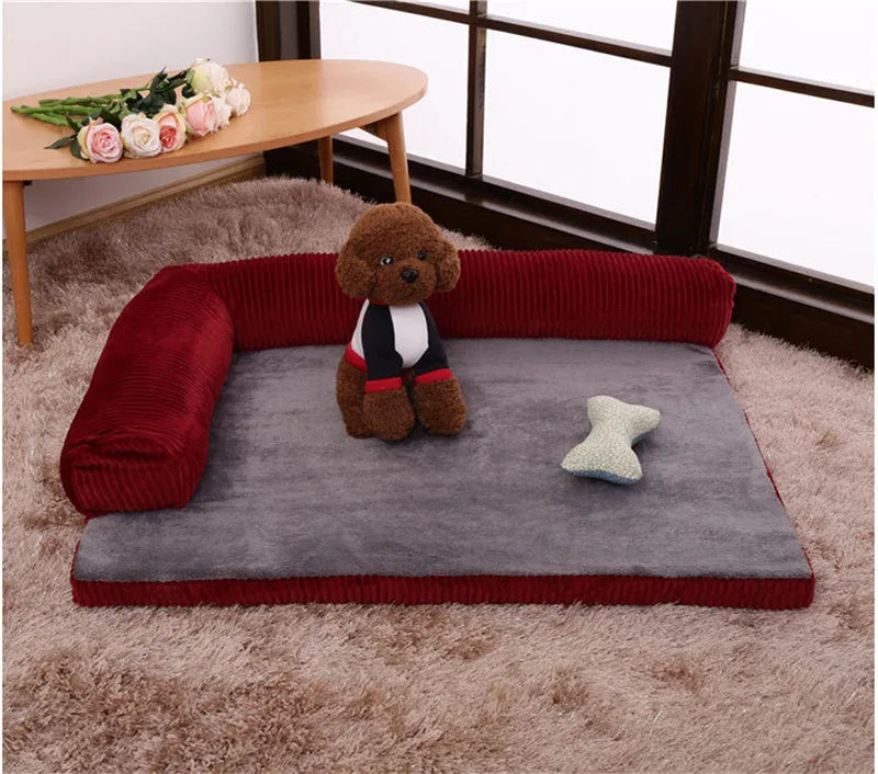 Corduroy fabric dog bed with bolster sides in a choice of coffee, grey, or red colours on a non-slip base.