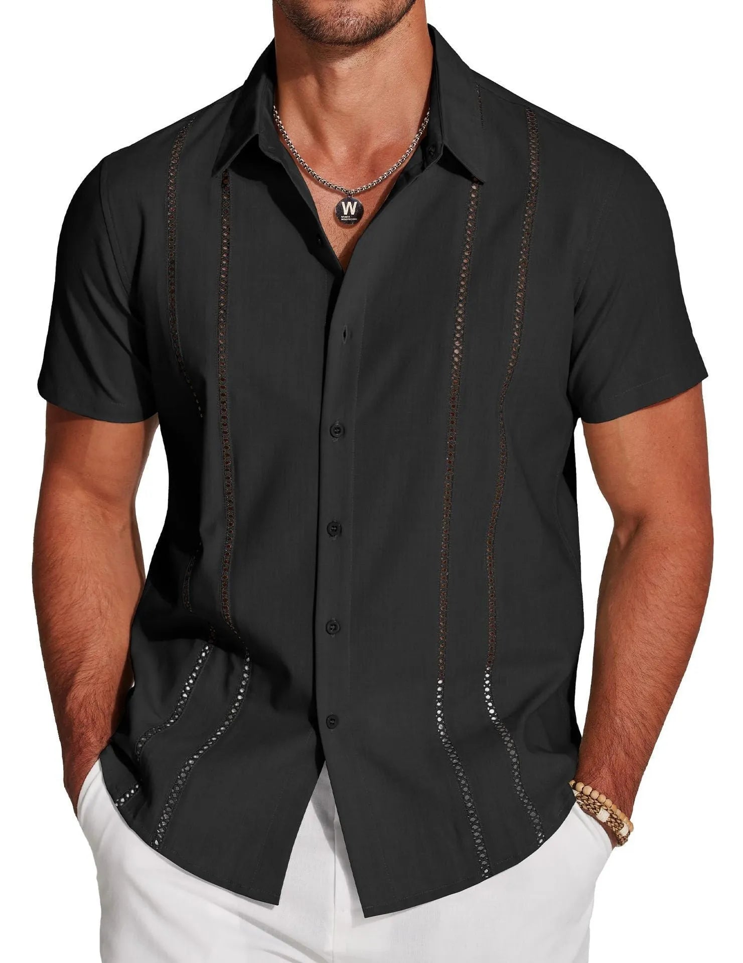 Man wearing a slim fit, short sleeve Hawaiian shirt with a digital print pattern in a casual setting.