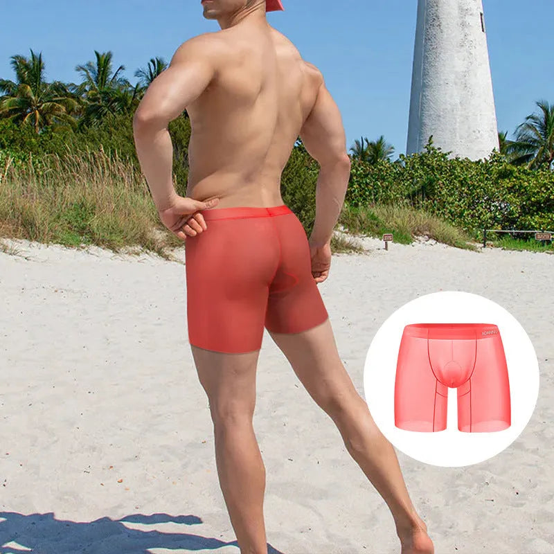 Men's low-rise nylon boxers in orange, pink, or red solid colours.