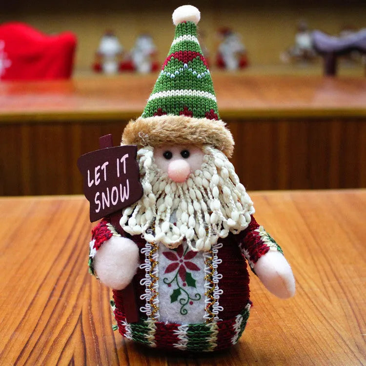 Red, green and white flannel Christmas snowman decorations measuring 18x13cm