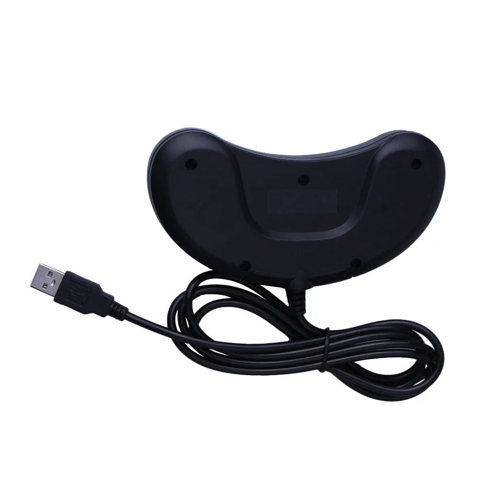 Black Sega USB PC game controller with 1.8 metre cable on a desk