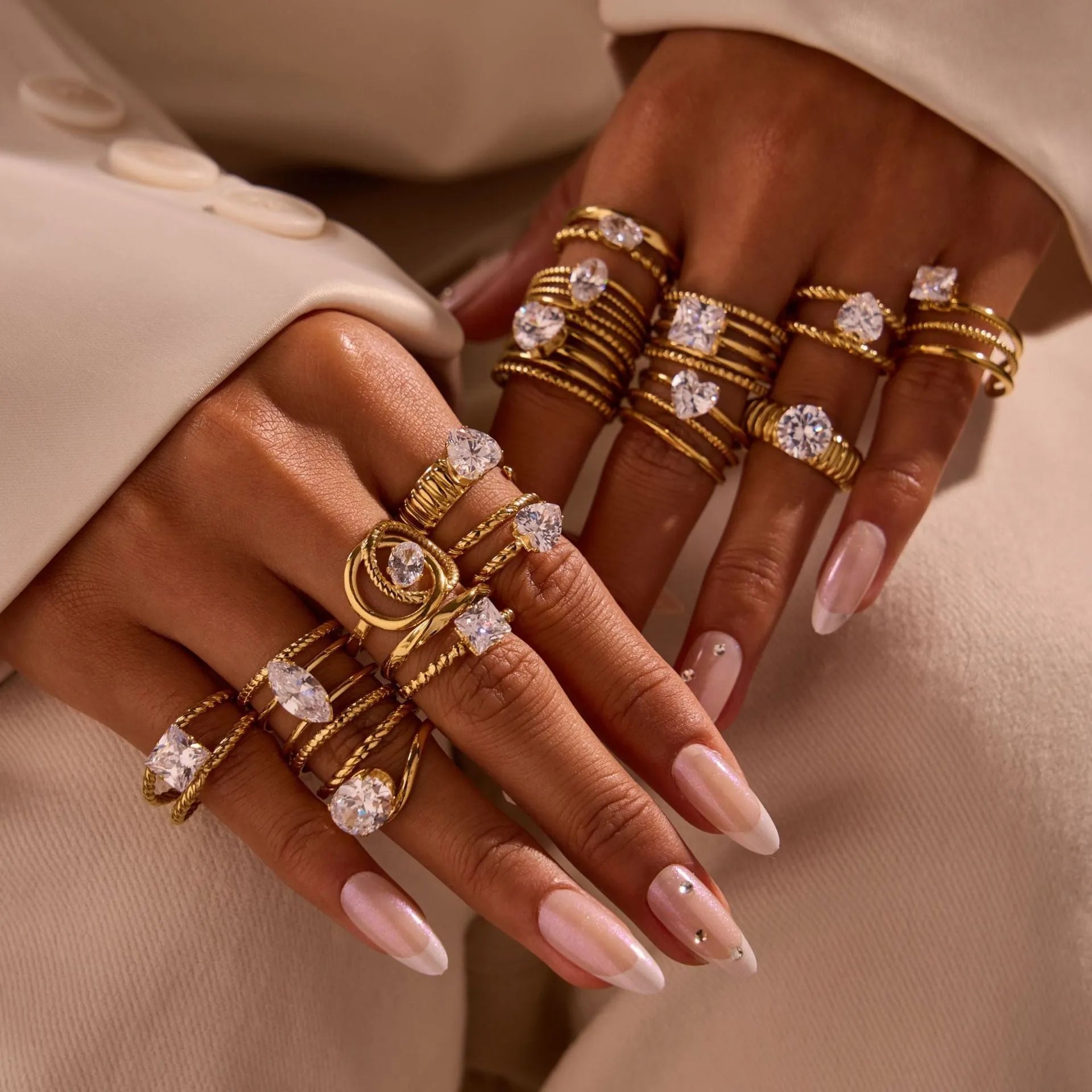 Women's geometric stainless steel ring with gold plating and inlaid zircon stones, shown in an open mouth free size design.