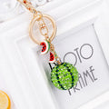 Green zinc alloy watermelon slice keychain on a metal ring