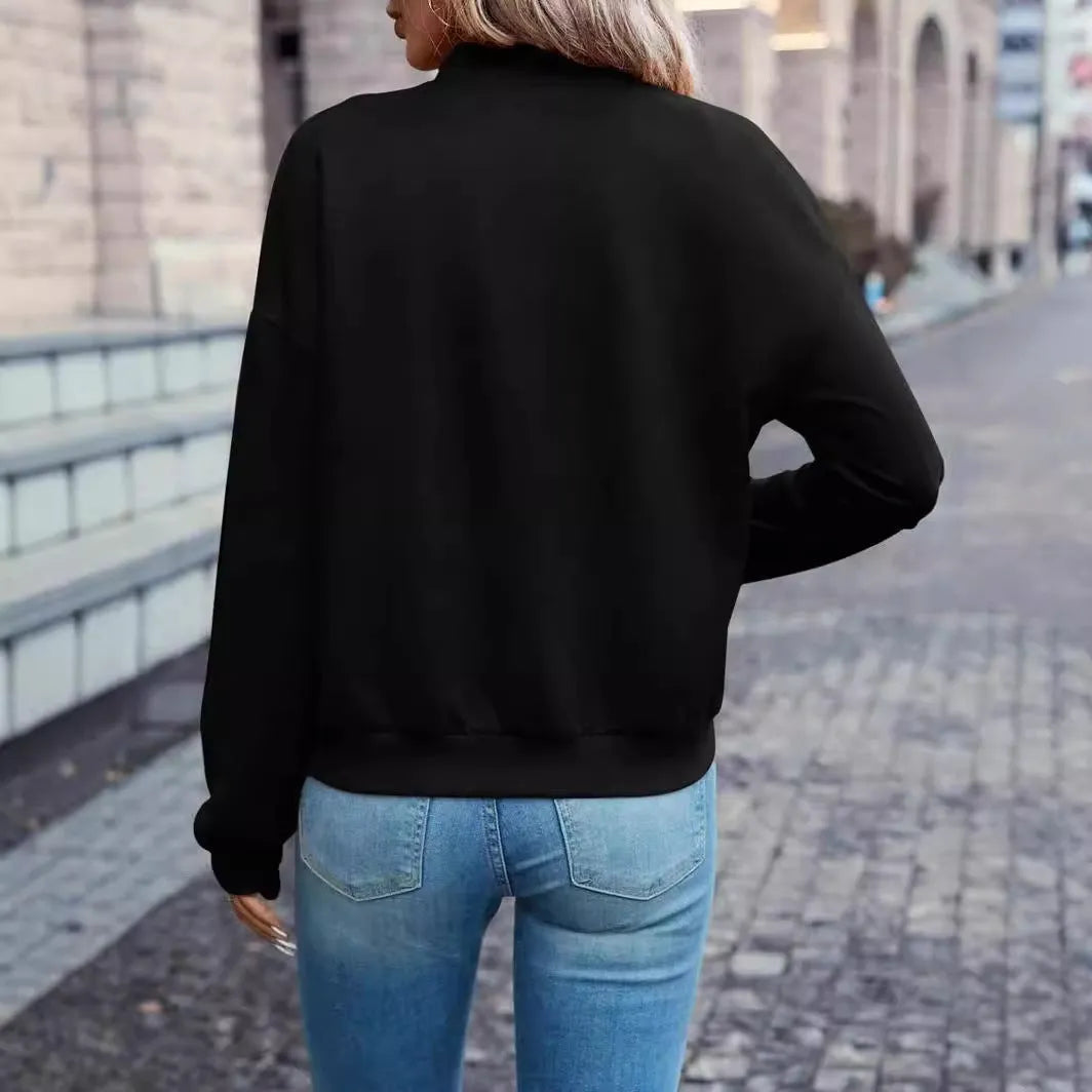 Women's black casual zip jacket with long sleeves and faux pocket detail