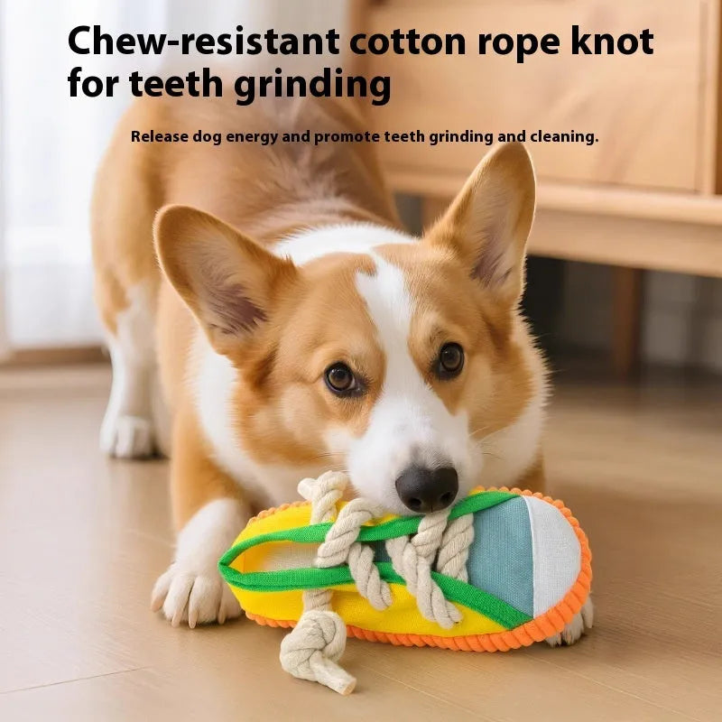 Plastic slipper-shaped dog chew toy in yellow colour for teething relief