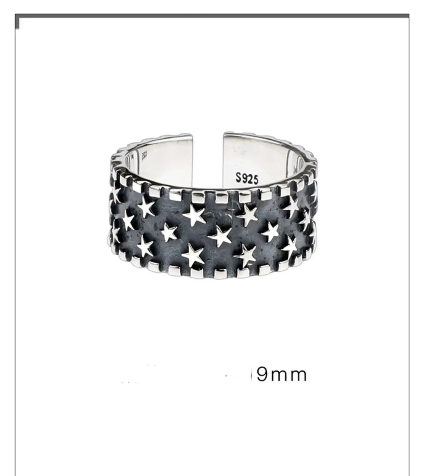 Close-up of a sterling silver ring with a geometric five-pointed star design on an adjustable band.