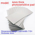 Black and grey plastic light-sensitive mat for photosensitive seals measuring 330mm by 110mm