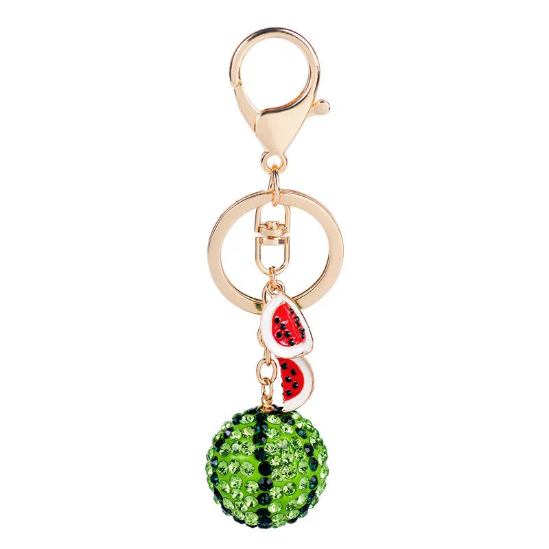 Green zinc alloy watermelon slice keychain on a metal ring
