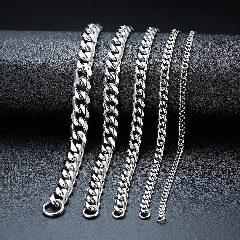 Six-sided Cuban link chain metal bracelet shown in gold, black and steel colour finishes with different width options.