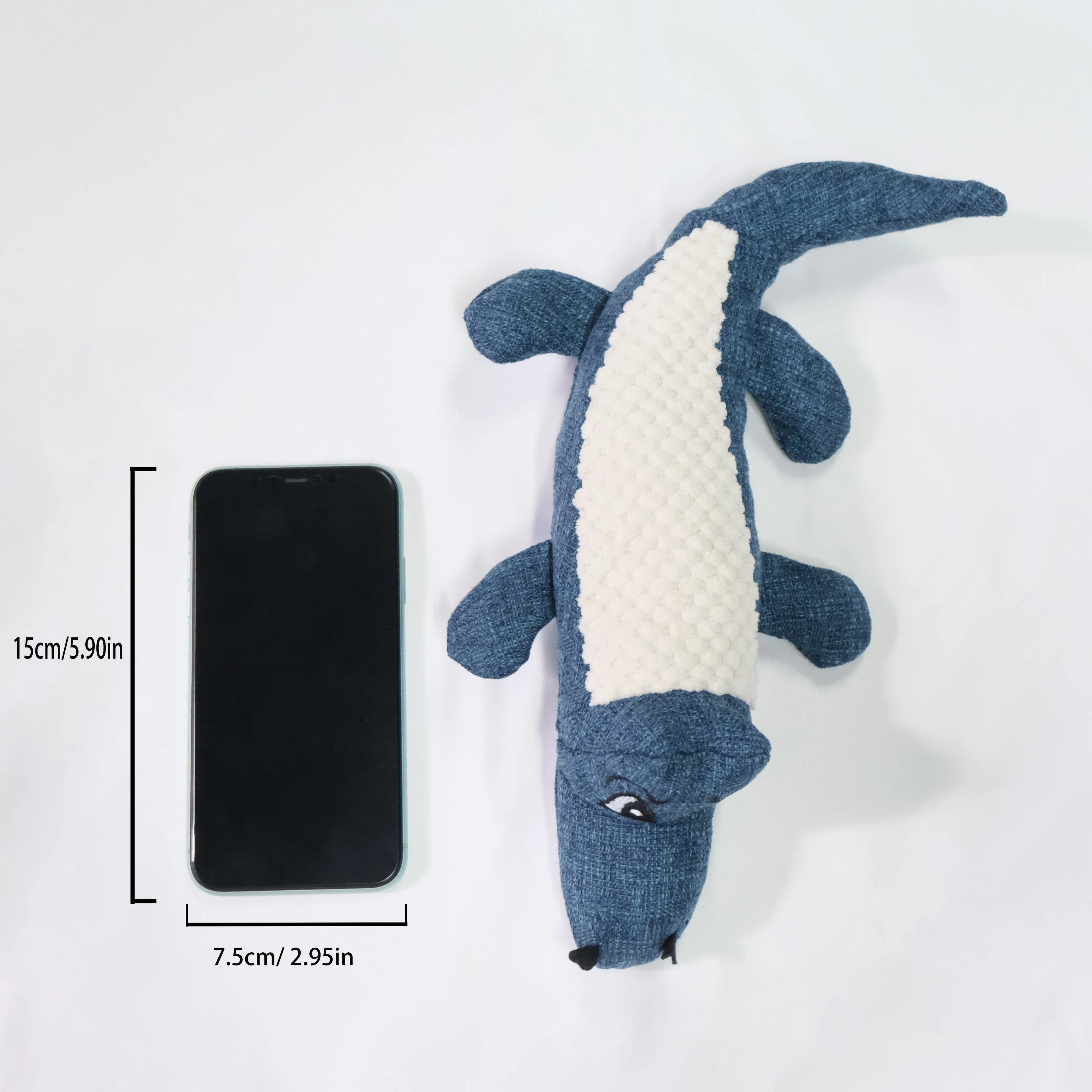 Blue, green, and red corn cob shaped plush dog toy with a textured surface on a white background.