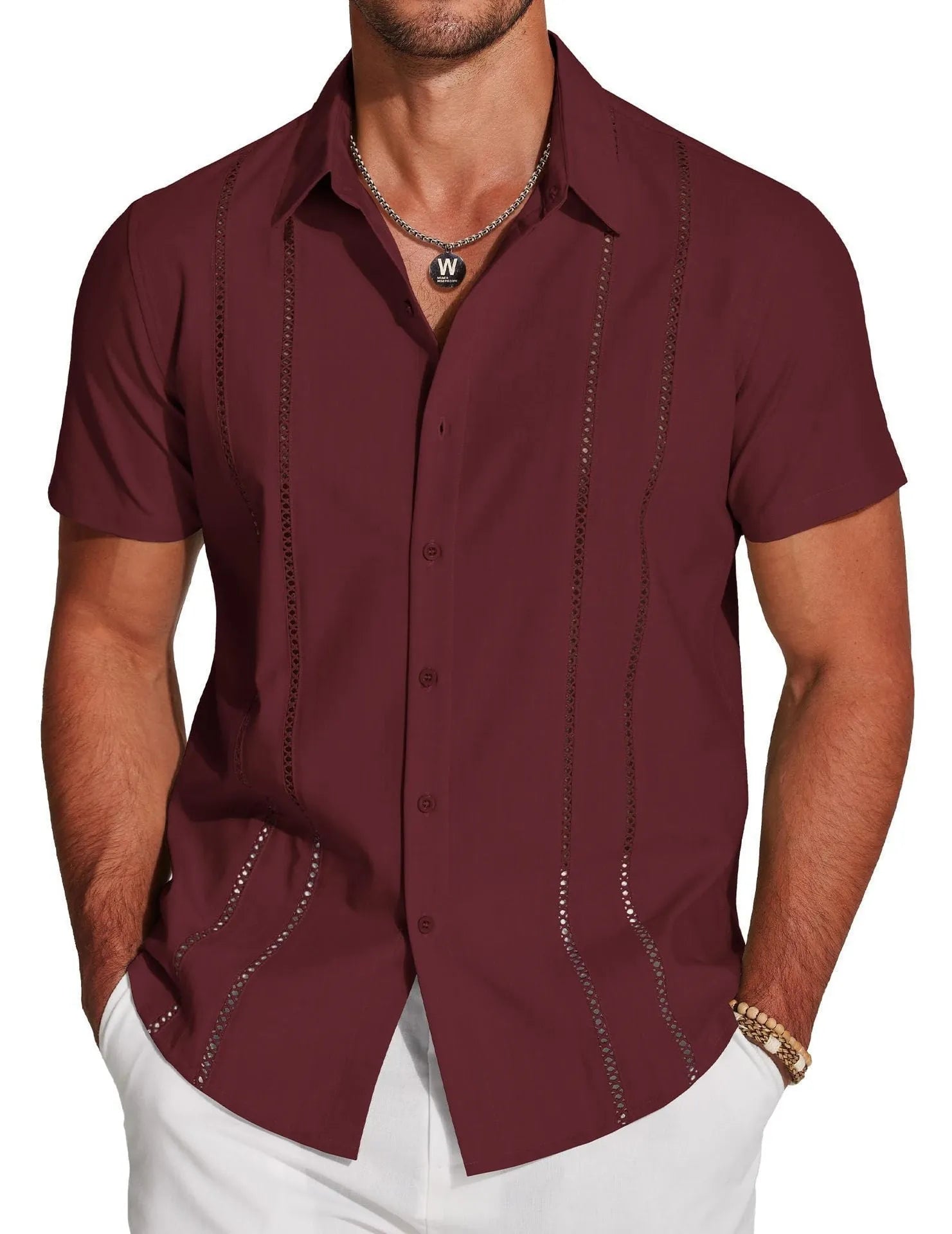 Man wearing a slim fit, short sleeve Hawaiian shirt with a digital print pattern in a casual setting.