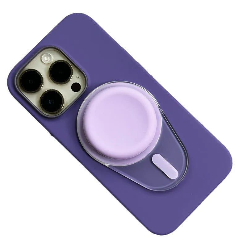 Magnetic suction telescopic folding phone bracket in white colour on desktop