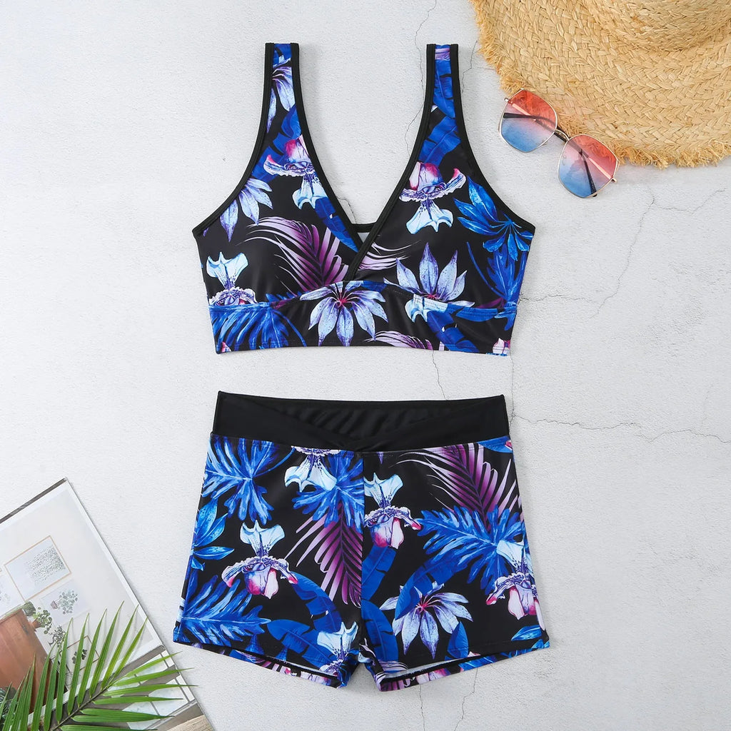 Women's two-piece sleeveless swimsuit with boxer shorts in a multi-colour print.