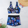 Women's two-piece sleeveless swimsuit with boxer shorts in a multi-colour print.