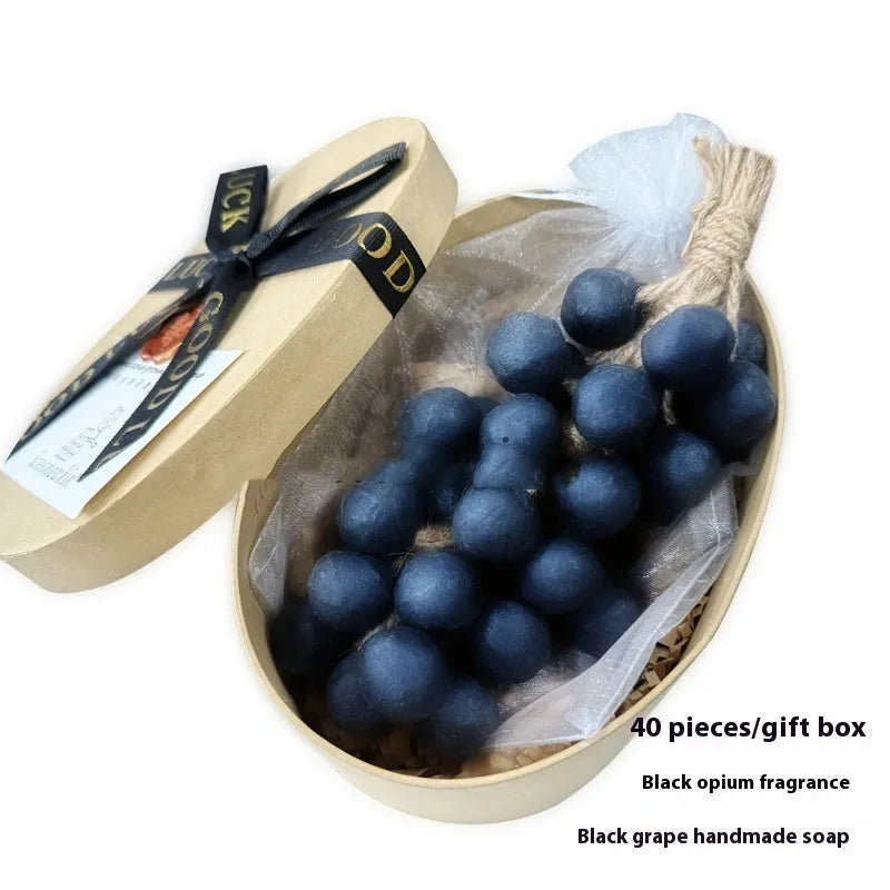 Grape handmade soap bars in black, green, purple and litchi variants showing mesh bag, gift box and long case packaging.