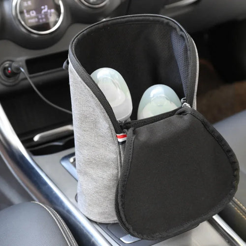 Grey Oxford cloth portable baby bottle warmer bag for car use with 12V charger and temperature display.