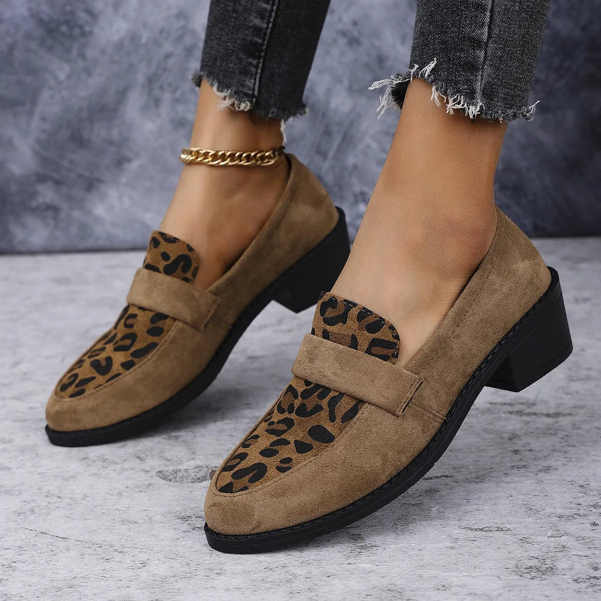 Leopard print slip-on suede shoes with chunky rubber sole and pointed toe design