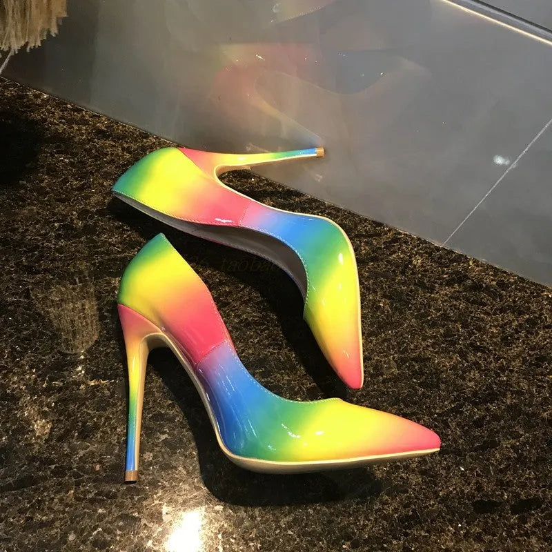 Rainbow coloured women's patent leather sandals with a pointed toe and an ultra-high thin heel.