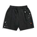 Black men's loose semi-elastic shorts with a colour button and zip fly, straight-leg above-the-knee length.