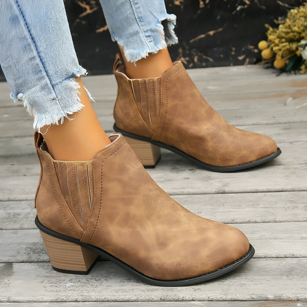 Women's black ankle boots with pointed toe and thick square slip-on heel