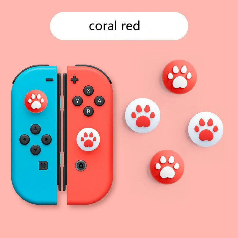 Four silicone rocker caps for Nintendo consoles in various colour combinations
