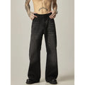 Black loose-fit straight-leg retro jeans on a mannequin, showing zip fly and casual style.