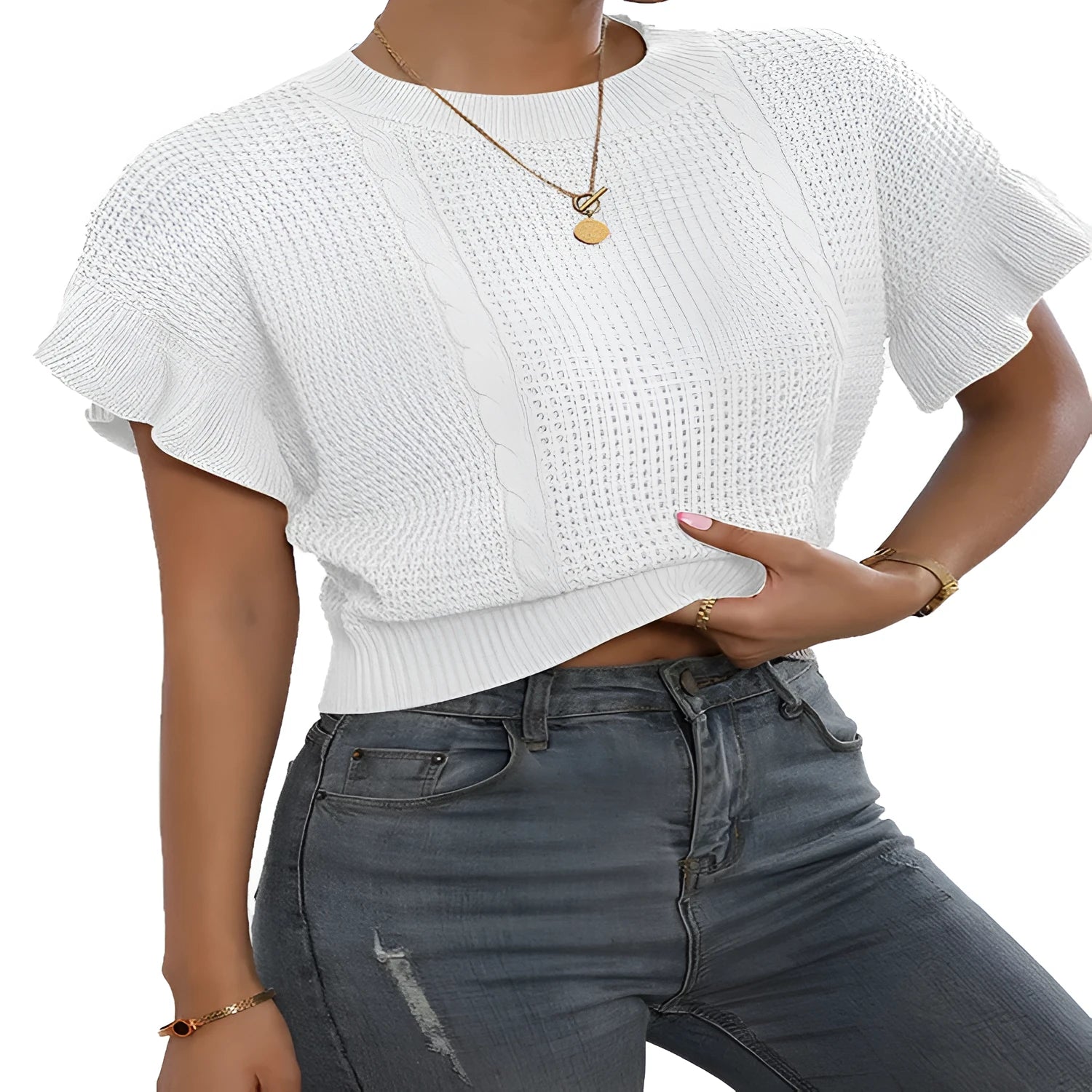 Loose-fitting white knitted pullover sweater with textured ruffled short sleeves on a model.