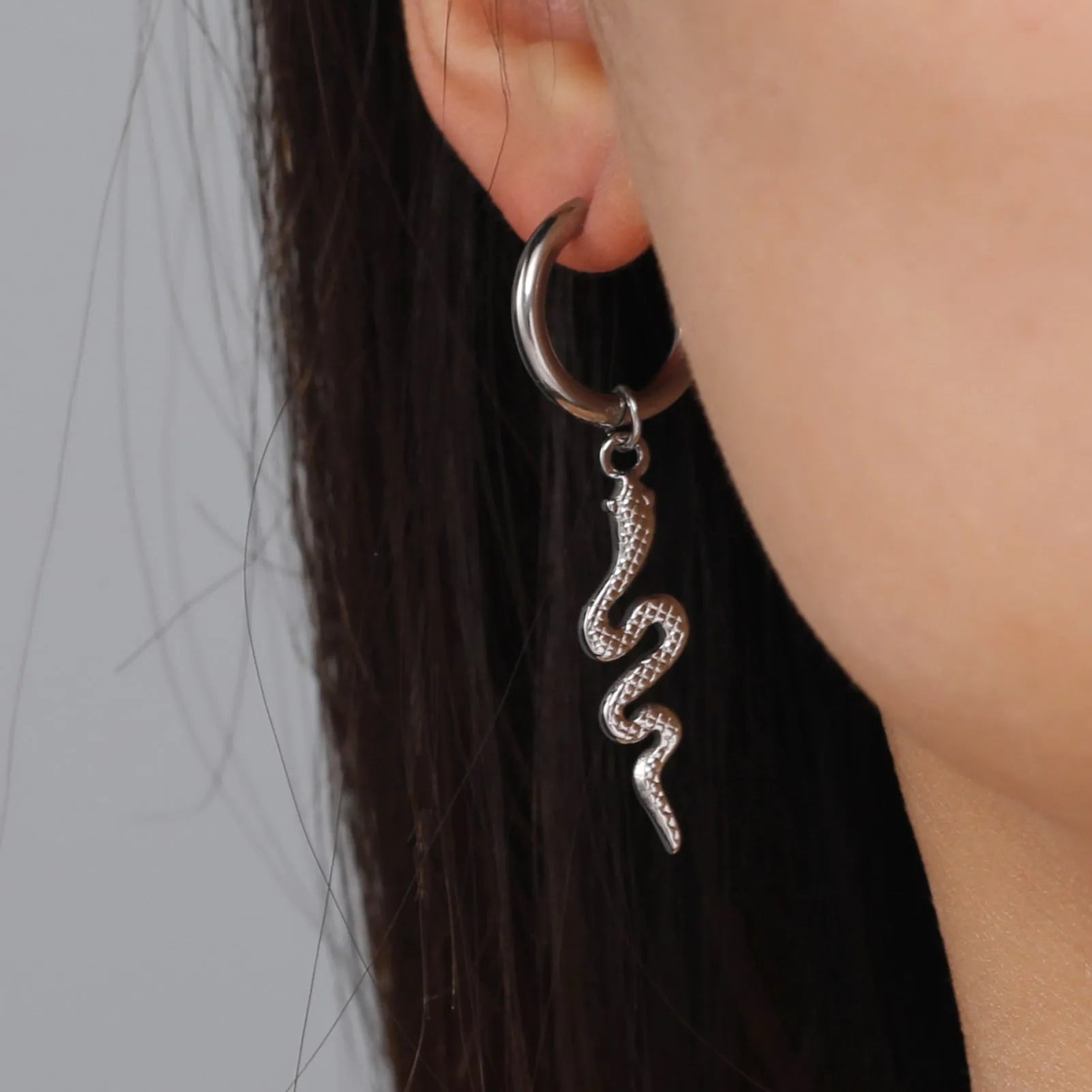 Gold plated stainless steel snake-shaped vintage clip-on earrings with Zodiac animal modelling