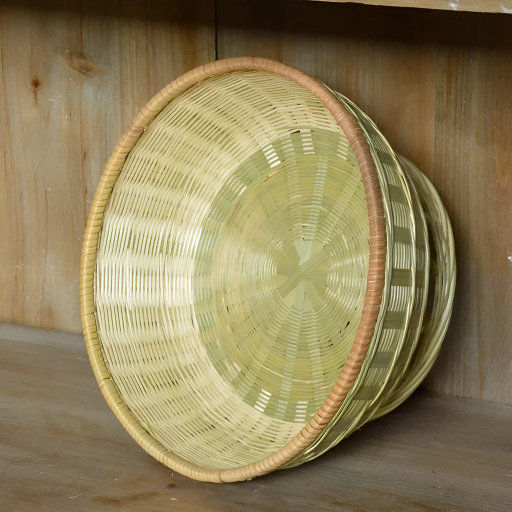Handmade natural bamboo storage basket in woven construction showing three size options