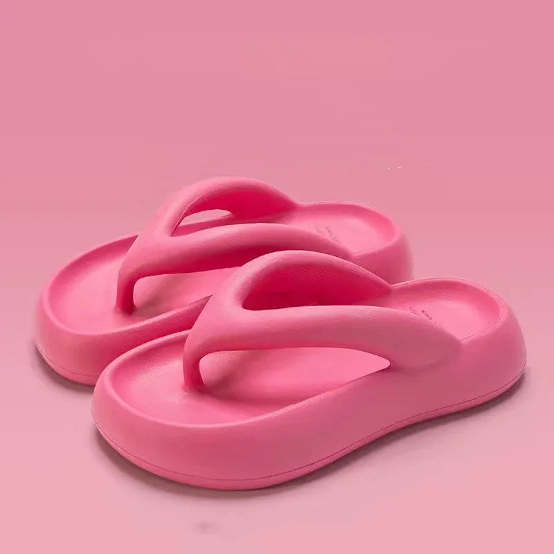 Solid colour thick-soled flip flops with decorative bow and injection moulded EVA construction
