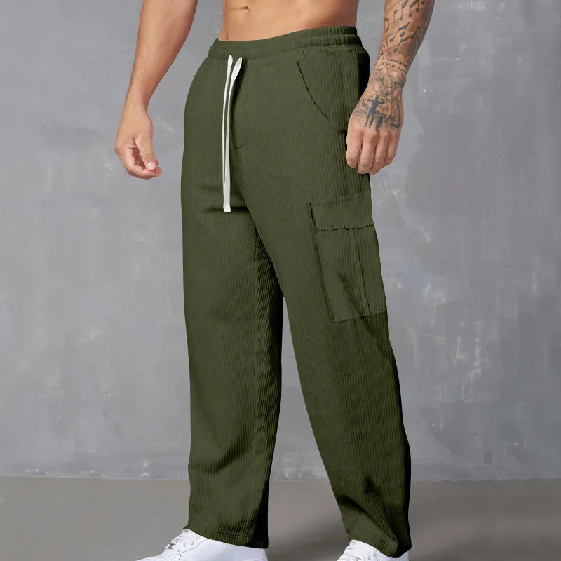 Men's corduroy cargo trousers in straight-leg wide-cut design with drawstring waist closure